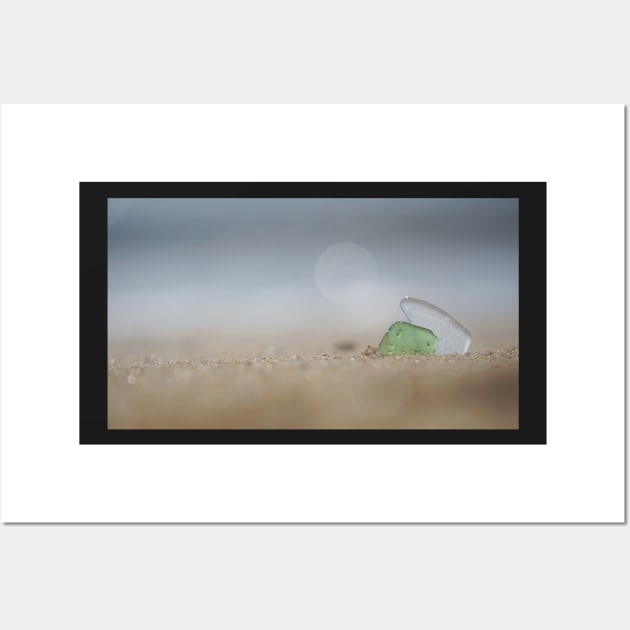 Two Shards of Sea Glass Together in the Sand Wall Art by 1Redbublppasswo